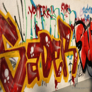 Graffiti am REWE-Markt - Fotograf Helmut Joa